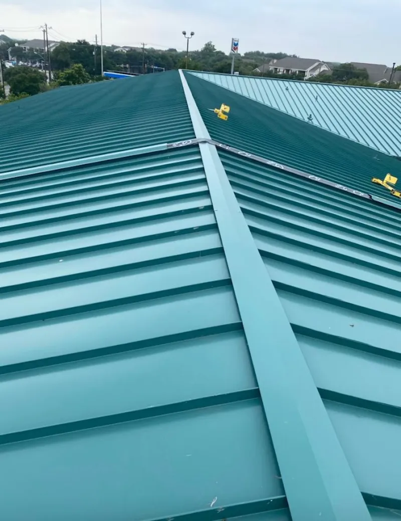 Green commercial metal roof ridge and valley for Metal Roof Repair in Manteca